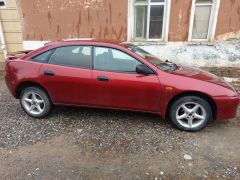 Сүрөт унаа Mazda 323