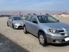 Сүрөт унаа Mitsubishi Outlander