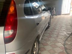 Фото авто Nissan Almera Tino