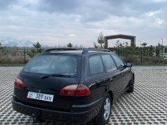 Фото авто Toyota Avensis