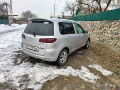 Photo of the vehicle Mazda Demio