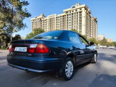 Сүрөт унаа Mazda 323