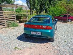 Photo of the vehicle Mazda 323