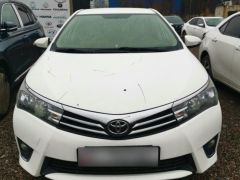 Photo of the vehicle Toyota Corolla