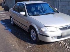 Photo of the vehicle Mazda 323