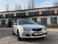 Фото авто Mazda 323