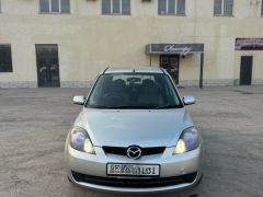 Фото авто Mazda Demio