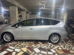 Photo of the vehicle Toyota Prius v (+)