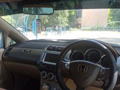 Фото авто Honda Fit Aria