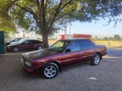 Фото авто Nissan Bluebird