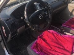 Photo of the vehicle Mazda 323