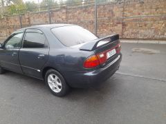 Сүрөт унаа Mazda 323