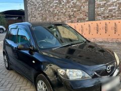 Сүрөт унаа Mazda Demio