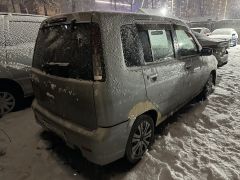 Photo of the vehicle Nissan Cube