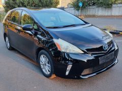 Фото авто Toyota Prius v (+)