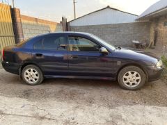 Сүрөт унаа Mitsubishi Carisma