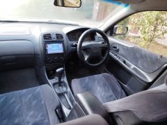 Фото авто Mazda Familia