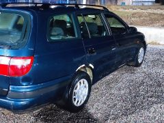 Photo of the vehicle Toyota Carina