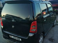 Photo of the vehicle Suzuki Wagon R+