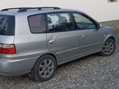 Photo of the vehicle Kia Carens