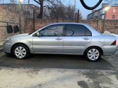 Сүрөт унаа Mitsubishi Lancer