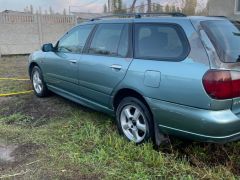 Фото авто Nissan Primera