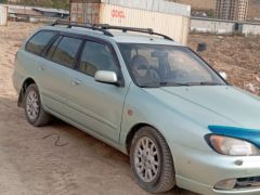 Photo of the vehicle Nissan Primera