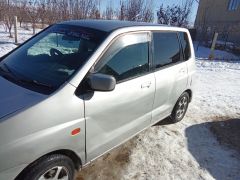 Photo of the vehicle Mitsubishi Dingo