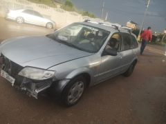 Сүрөт унаа Mazda 323