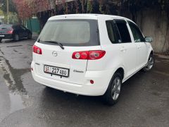 Фото авто Mazda Demio