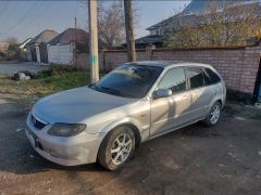 Фото авто Mazda 323