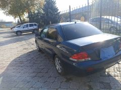 Фото авто Mitsubishi Lancer