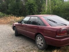 Фото авто Mazda 626