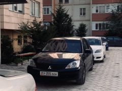 Сүрөт унаа Mitsubishi Lancer