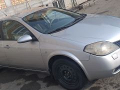 Photo of the vehicle Nissan Primera