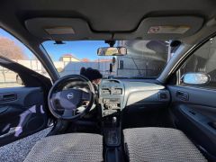 Фото авто Nissan Almera Classic