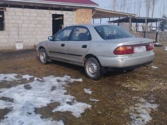 Photo of the vehicle Mazda 323