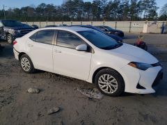 Photo of the vehicle Toyota Corolla