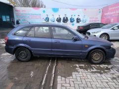 Фото авто Mazda 323