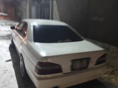 Сүрөт унаа Nissan Laurel