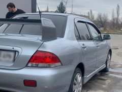 Фото авто Mitsubishi Lancer