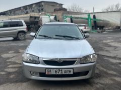 Фото авто Mazda 323