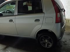 Photo of the vehicle Daihatsu Cuore