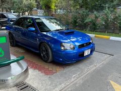 Photo of the vehicle Subaru Impreza WRX STi