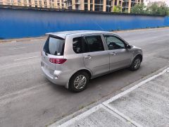 Photo of the vehicle Mazda Demio