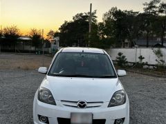 Photo of the vehicle Mazda Demio