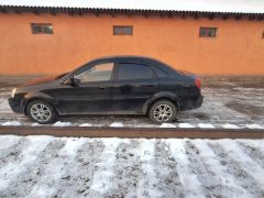 Фото авто Suzuki Forenza