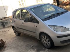 Photo of the vehicle Mitsubishi Colt