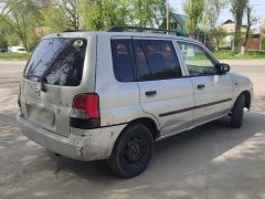 Photo of the vehicle Mazda Demio