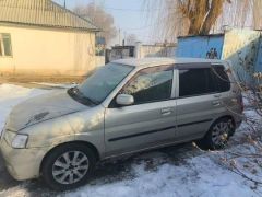 Сүрөт унаа Mazda Demio